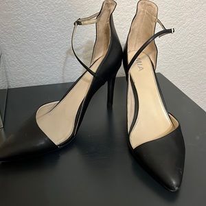 Size 12 black asymmetrical pump